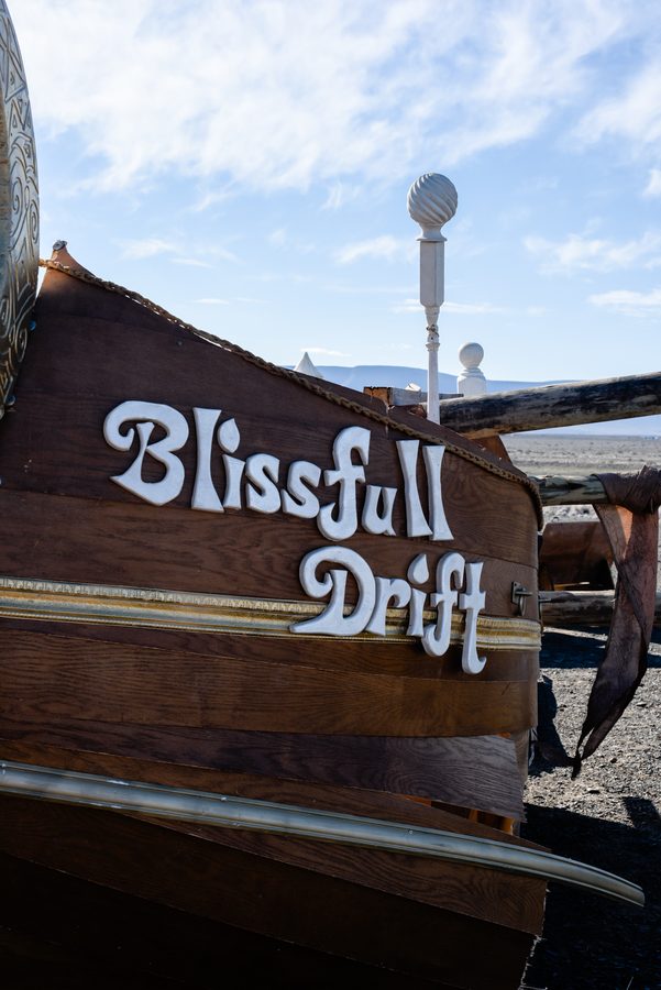 The painted bow of the Blissful Drift, the camp's boat