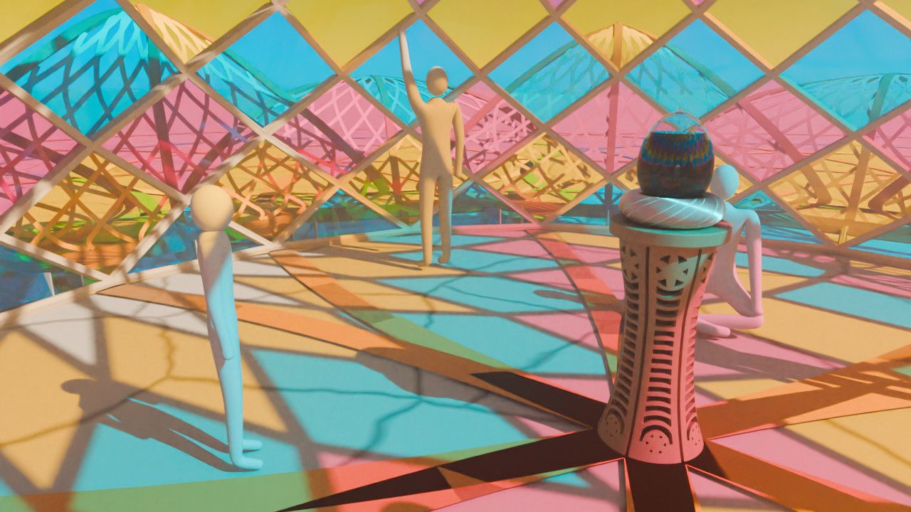 The carved column at the centre of The Seed, under the coloured panes, with people around it