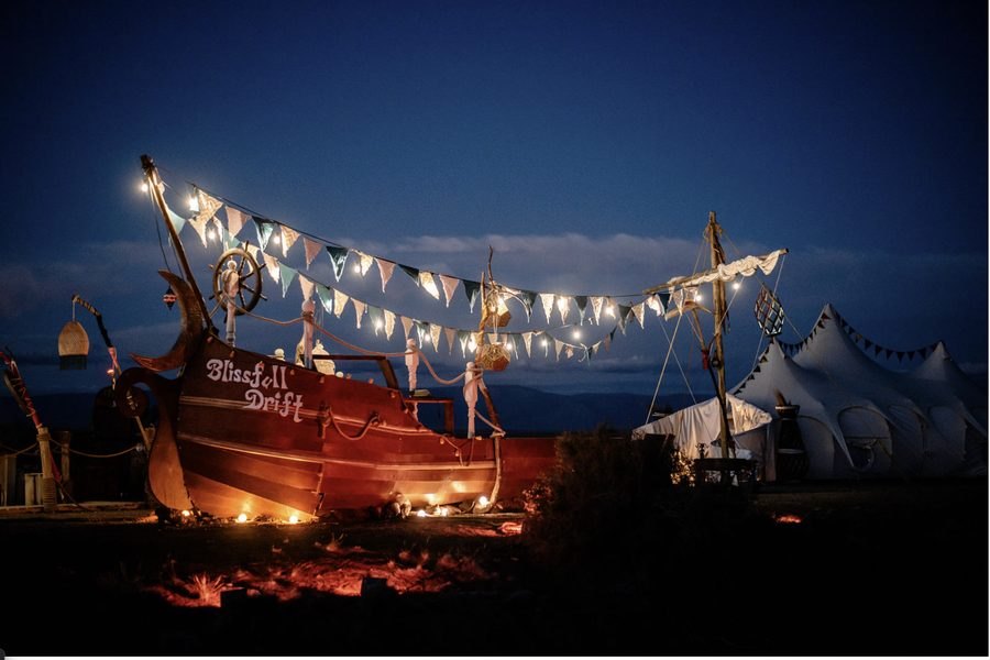 Blissfull Drift at night under strings of lights